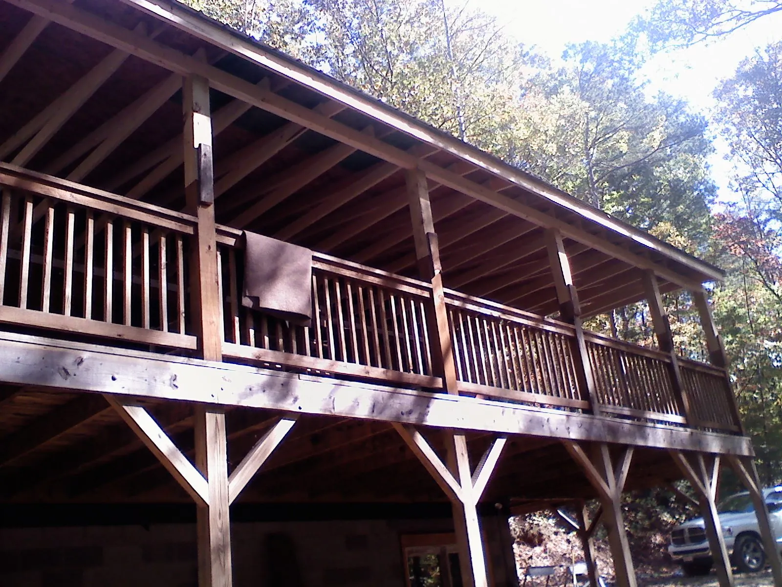 Timber framing under a new elevated porch and deck — Roof Leak Repair in Putnam Valley by Roofing Brothers
